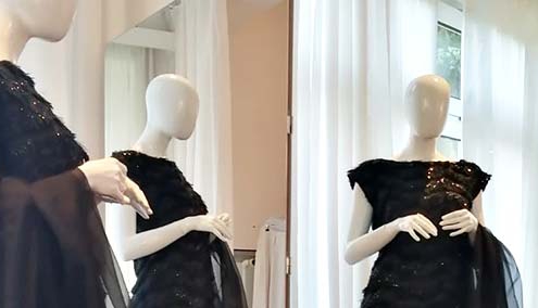 Schaufensterpuppen im Maßgeschneiderten Dress vor dem Spiegel